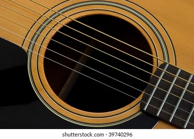 The Sound Hole Of An Acustic Guitar