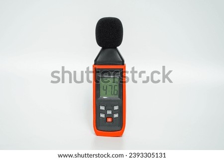 Sound level meter on a white background. Apparatus for measuring noise level in the room. Equipment for measuring sound level. Noise meter on a white background. Equipment for construction and repair

