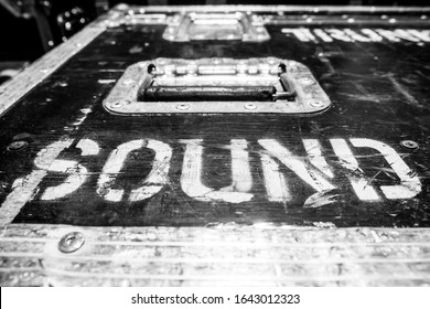 Sound logo on touring rack pop rock flight cases texture background 