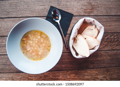 Soup with bread on the table