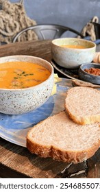Soup and bread on a table