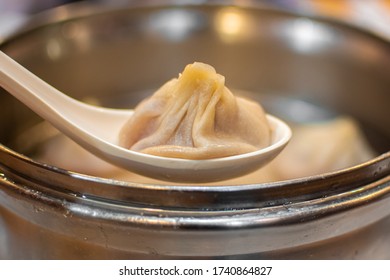 Soup Dumpling Xiao Long Bao In Spoon 