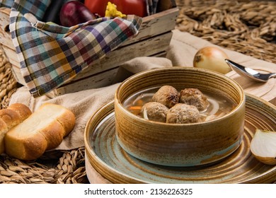 Soup With Meatballs In A Bowl. Wooden Background. Product Photography For A Restaurant