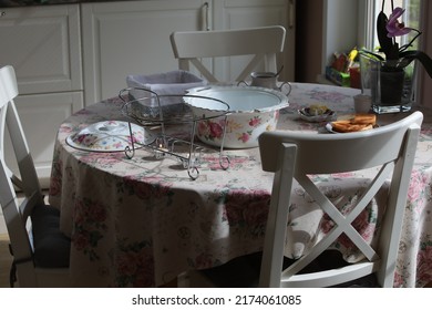 Soup Tureen On A Table Covered With A Tablecloth Toast Bread On A Plate The Interior Of A Simple Country House With White Wooden Chairs During Lunch