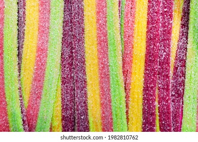 Sour Candy Strips Background. Top View