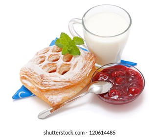 Sour Cherry Cake, Jam And A Cup Of Milk On White