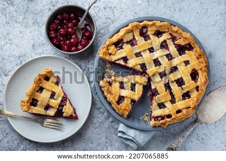 sour cherry pie in baking dish, top view