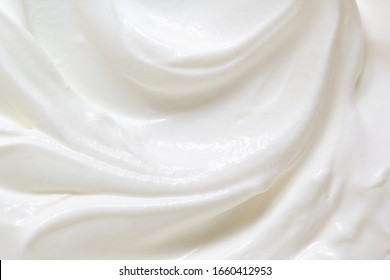 Sour Cream, Greek Yogurt Texture. White Dairy Product Swirl Closeup. Creamy Healthy Natural Food Macro Photography. Top View