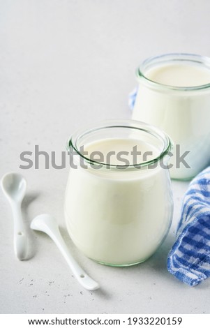 Similar – Image, Stock Photo glass jars with homemade yogurt