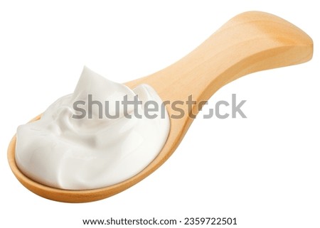 sour cream on wooden spoon, mayonnaise, yogurt, isolated on white background, clipping path, full depth of field