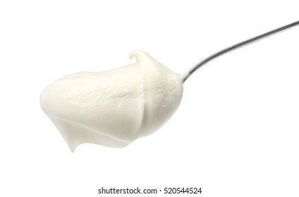 Sour Cream In Spoon Isolated On White Background