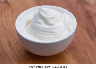 Sour Cream In A White Bowl