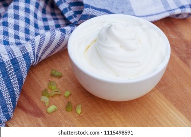 Sour Cream In A White Bowl