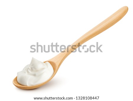 sour cream in wooden spoon, mayonnaise, yogurt, isolated on white background, clipping path, full depth of field