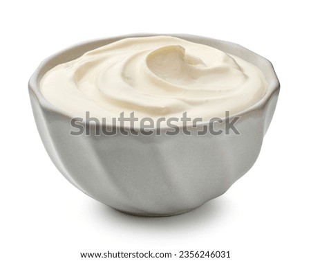 sour cream yogurt in bowl isolated on white background