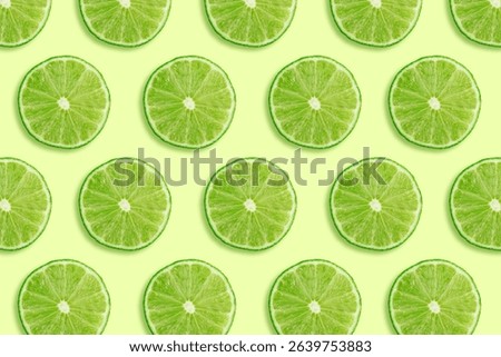 Sour key section or slice of lime pattern background. Little juicy green lemon collage or fresh organic citrus