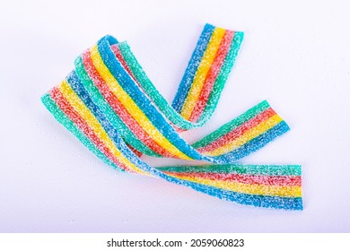 Sour Rainbow Candy Belt On The White Background.