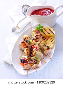 Sour And Sweet Grilled Turkey Skewers With Pinapple, Kiwi And Apricot.