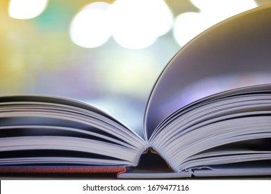 source of knowledge, open book on a blurred background. - Powered by Shutterstock