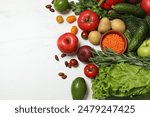 Source of protein for vegetarians. Different fresh vegetables, fruits and herbs on white marble table, space for text