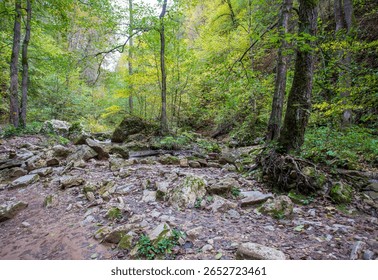 the source of the river, a walk along the riverbed with an overview of the canyon of the river and the shallow riverbed