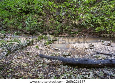 the source of the river, a walk along the riverbed with an overview of the canyon of the river and the shallow riverbed