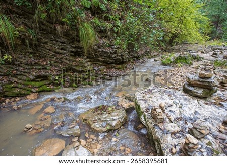 the source of the river, a walk along the riverbed with an overview of the canyon of the river and the shallow riverbed