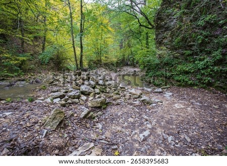 the source of the river, a walk along the riverbed with an overview of the canyon of the river and the shallow riverbed