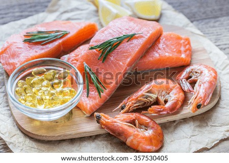 Sources of Omega-3 acid (salmon, shrimps, Omega-3 pills) on the 