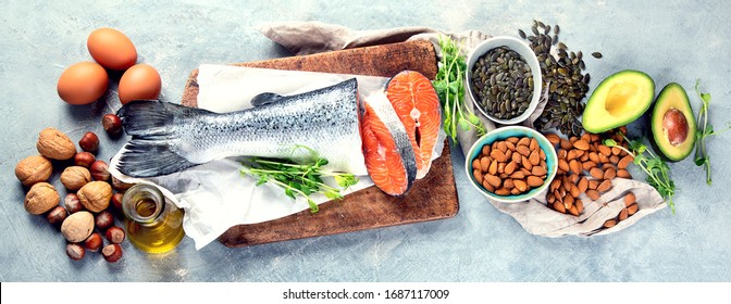 Sources of omega-3 acids. Foods high in healthy fat, vitamin and antioxidants. Top view. Panorama, banner - Shutterstock ID 1687117009