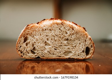 Sourdough Bread Loaf on Cutting Board - Powered by Shutterstock