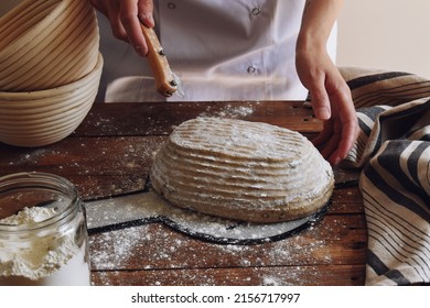 Sourdough Bread Proofing And Cutting. Chef Baking Bread