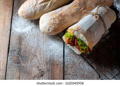 Sourdough Homemade Bread. Italian Ciabatta Panini Sandwich With Chicken And Tomato. Selective Focus, Copy Space