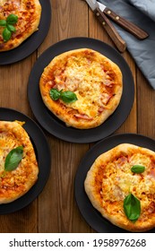 Sourdough Pizza Homemade Baked Pizza Rolls, Or Mini Pizza On Wooden Plate