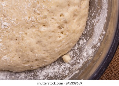 Sourdough Yeast Dough Rises In A Bowl On The Table