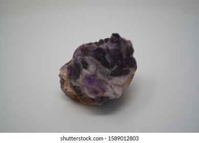 south africa amethyst mineral rock, on a white background    