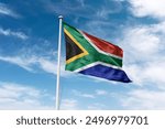 South Africa flag waving at cloudy sky background. the Republic of South Africa (RSA) flag.