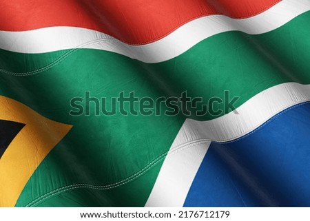 South Africa Flag Waving in the Wind on Flagpole, on sky background