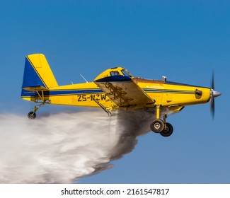 South Africa - May 28 2022: A Beautiful Air Tractor AT-602 Giving The Crowd At The 2022 Parys Airshow An Awesome Water Drop Demo!