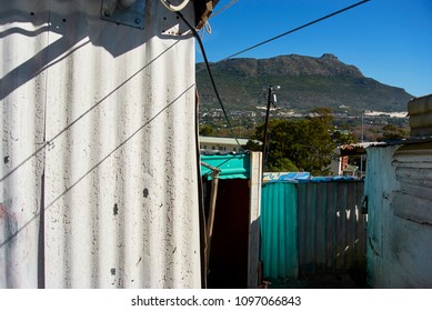 In South Africa, Near Cape-town, Imizamo Yethu Township (Xhosa, Meaning Our Efforts And Commonly Known As Mandela Park), Is An Informal Settlement In The Greater Hout Bay Valley Area. The Settlement