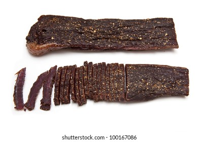 South African biltong (beef) isolated on a white background