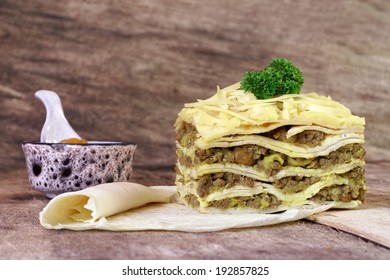 South African bobotie dish layered with pancakes