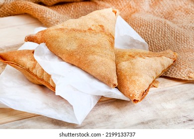 South African Chicken Samosas On Mottled Grey With Copy Space