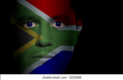 South African Flag Painted/projected Onto A Man's Face.