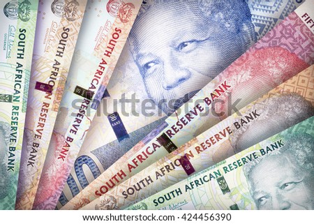 South African Rand bills creating a colorful background