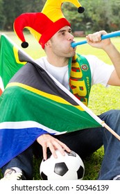 South African Soccer Fan Blowing A Vuvuzela