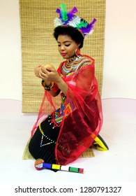 South African Zulu Bride drinking from calabash