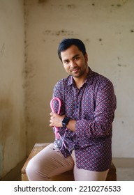 South Asian Young Male Doctor Holding A Stethoscope Wearing Shirt 