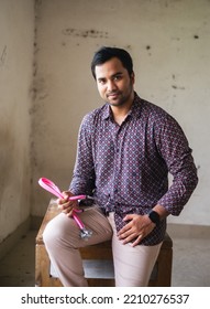 South Asian Young Male Doctor Holding A Stethoscope Wearing Shirt 