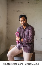 South Asian Young Male Doctor Holding A Stethoscope Wearing Shirt 